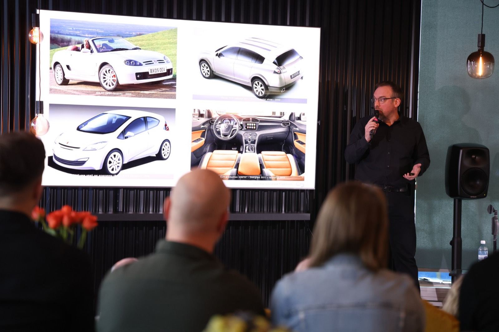 Automotive designer presenting car design work