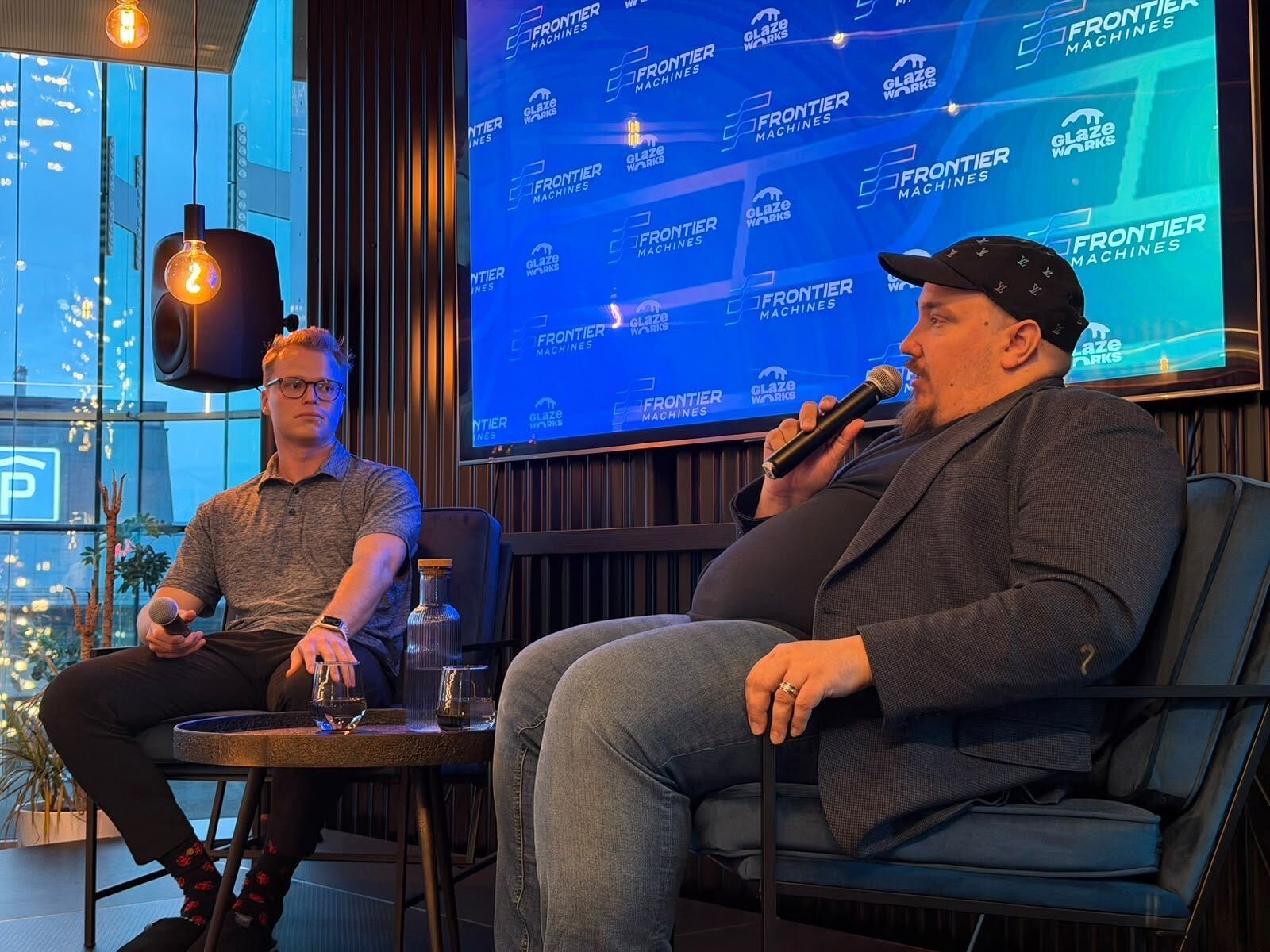 Fireside chat on stage at a Frontier Machines session