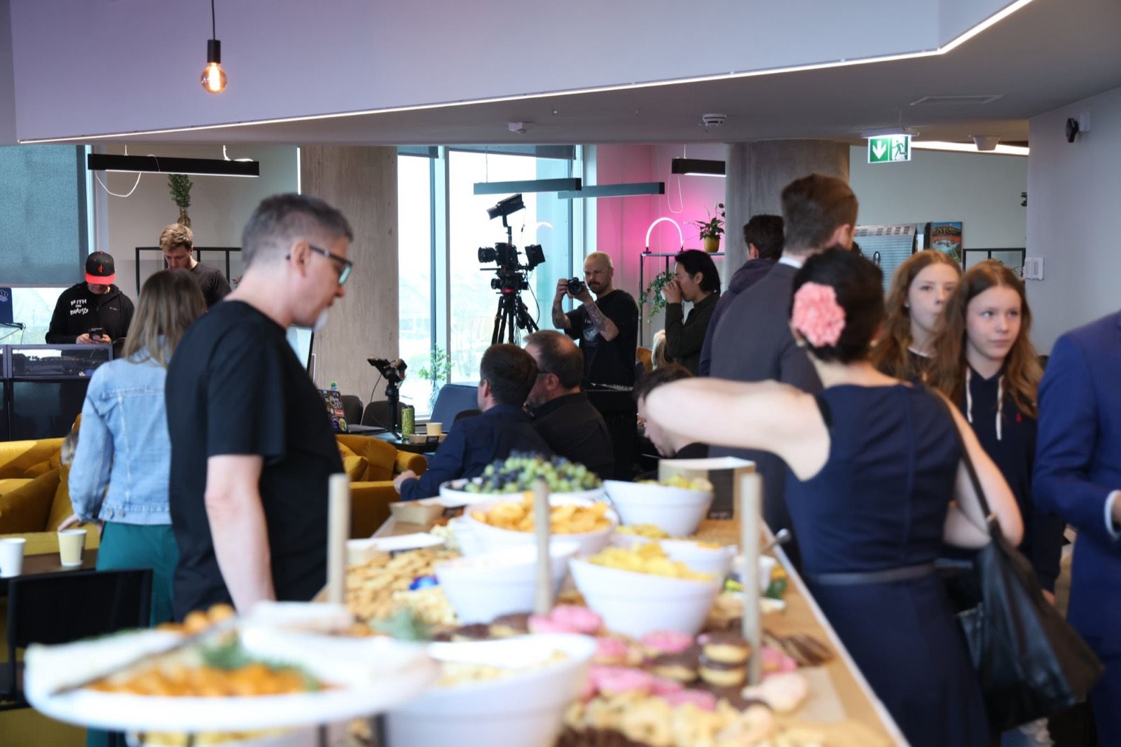 Guests networking over food after a session